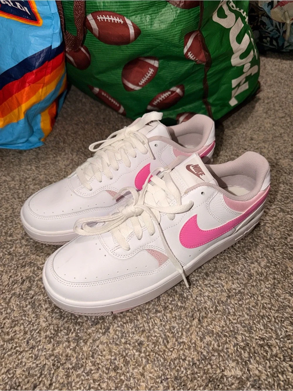 Nike Women’s White Sneakers with Pink Swoosh and Pale Pink Accents